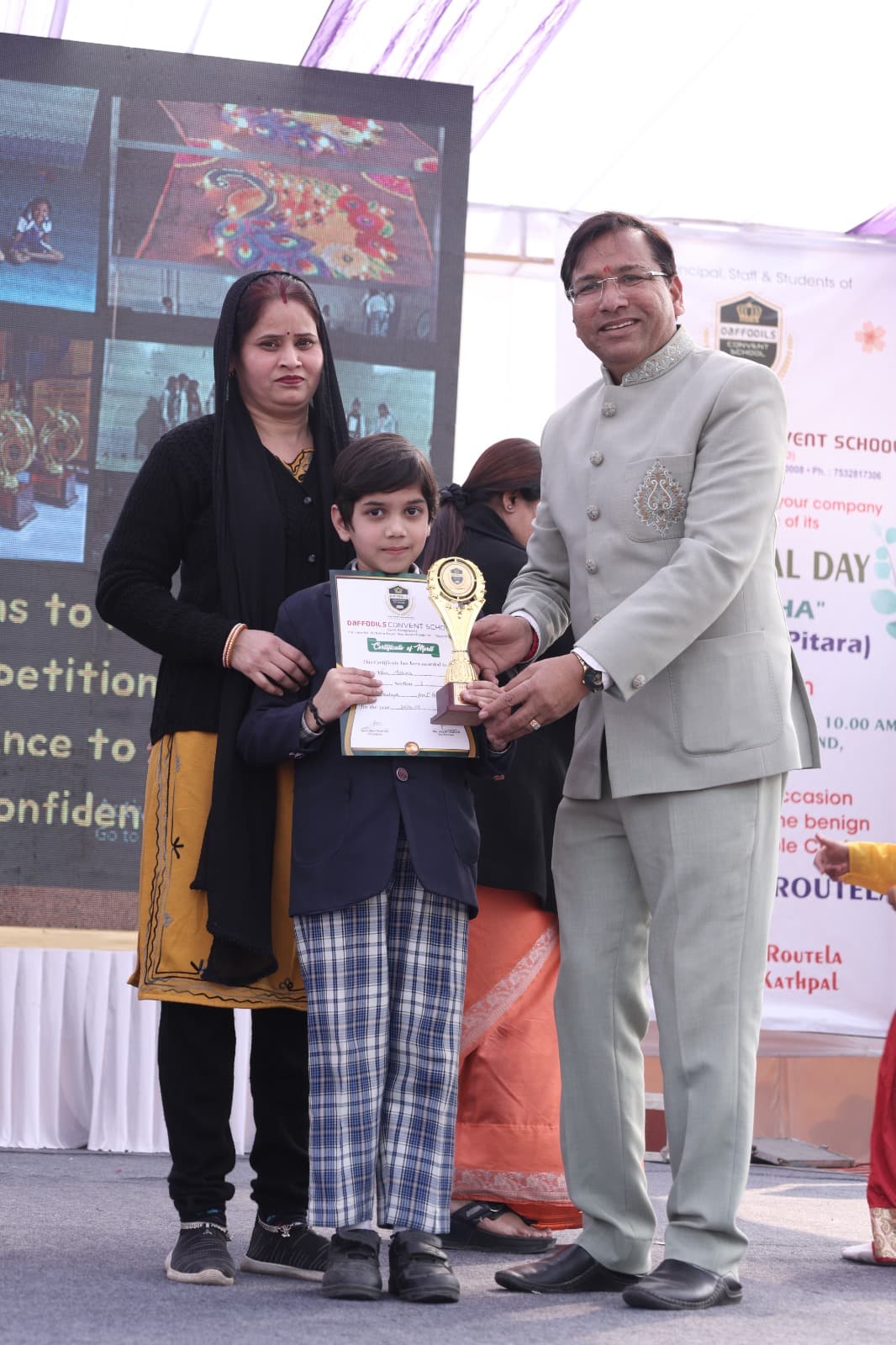 Student receiving award